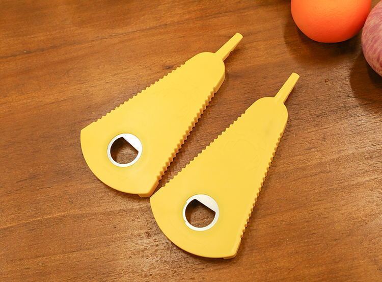Multi-functional bottle cap opener