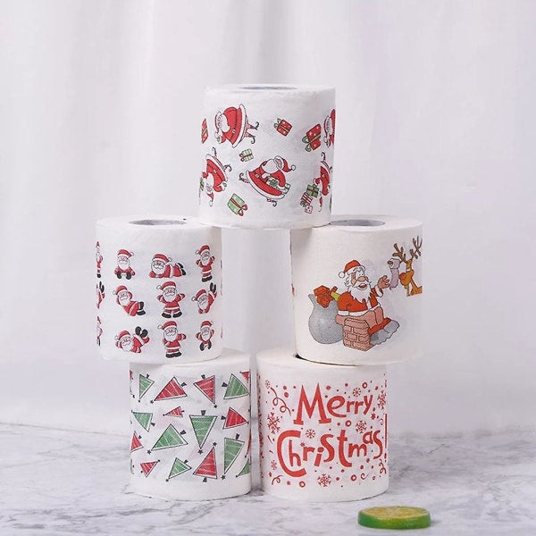 rolls of Christmas themed toilet paper for home, office or restroom