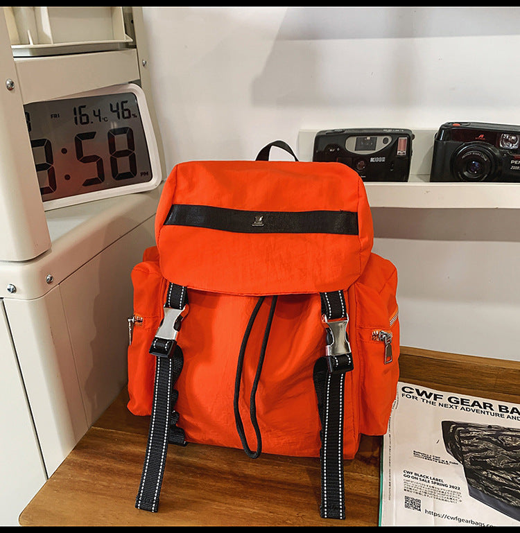 Orange Lightweight Nylon Backpack - Water Resistant Travel Daypack for Women & Men