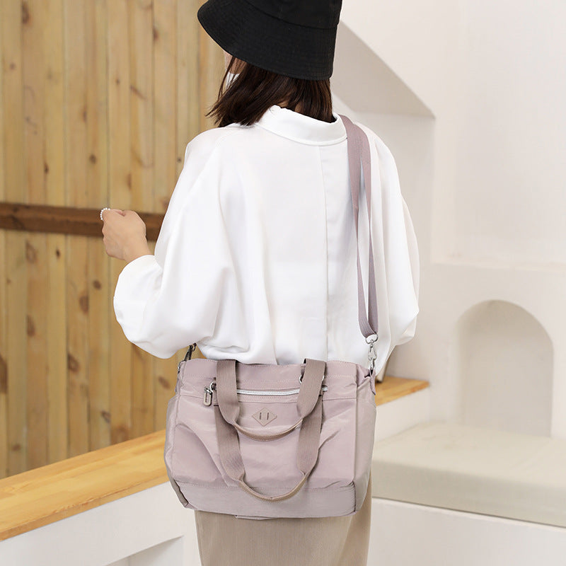 Light Purple Versatile Water-Repellent Nylon Tote Bag - Lightweight Multi-Pocket Shoulder & Crossbody Handbag