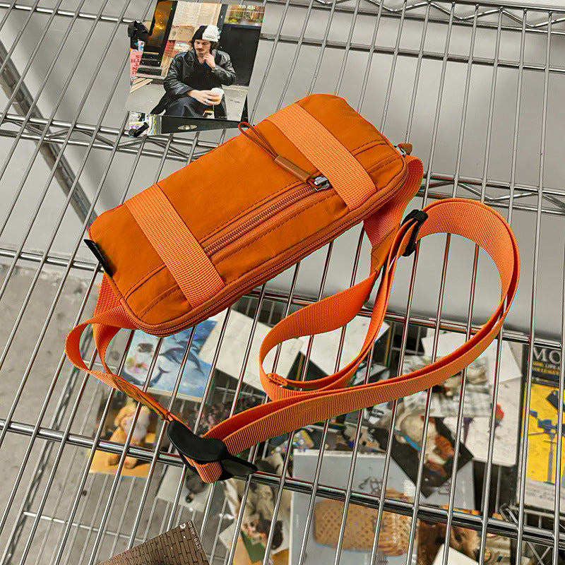 Orange Unisex Mini Crossbody Waist Bag Lightweight Nylon Running Belt Phone Pouch 21cm Slim Sports Chest Sling for Travel & Gym