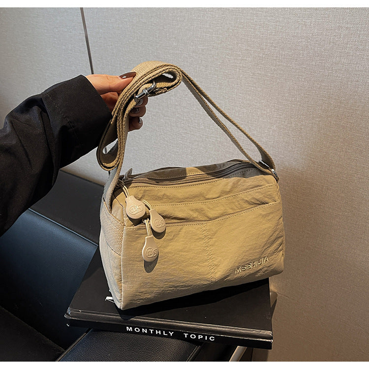 Women's Nylon Crossbody Bag Multi-Pocket Water Resistant Shoulder Messenger Handbag Lightweight Casual Satchel with Adjustable Wide Strap for Travel and Daily Use Khaki