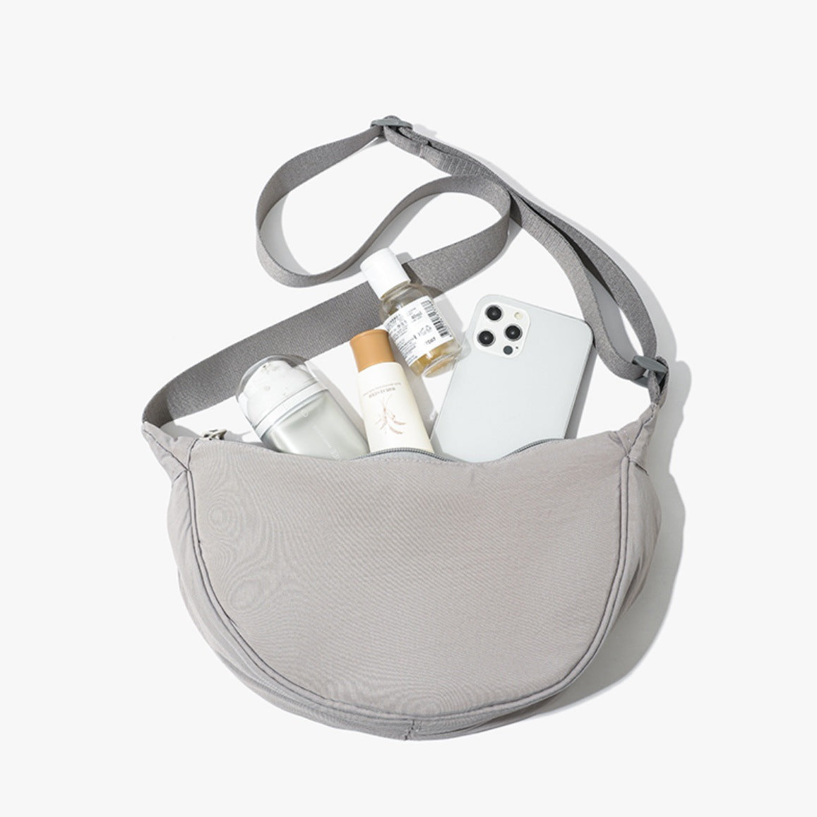 Grey Lightweight Nylon Crossbody Bag – Compact Saddle Style with Adjustable Strap for Everyday Use