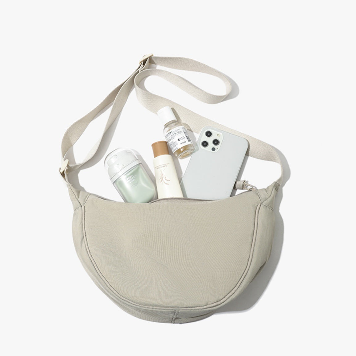 Beige Lightweight Nylon Crossbody Bag – Compact Saddle Style with Adjustable Strap for Everyday Use