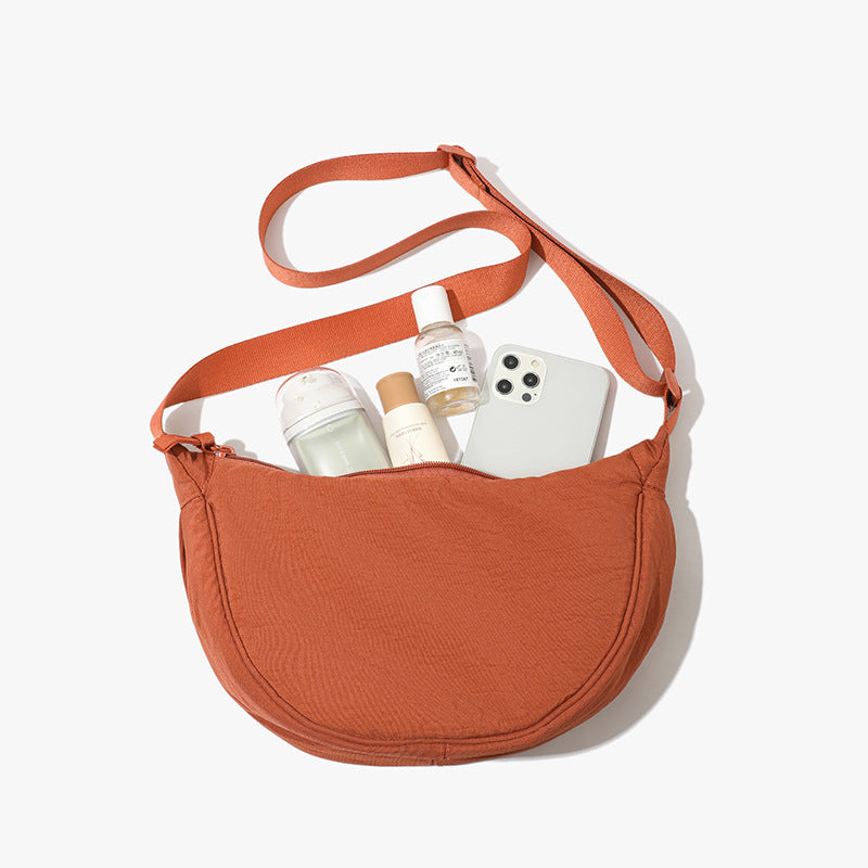 Orange Lightweight Nylon Crossbody Bag – Compact Saddle Style with Adjustable Strap for Everyday Use