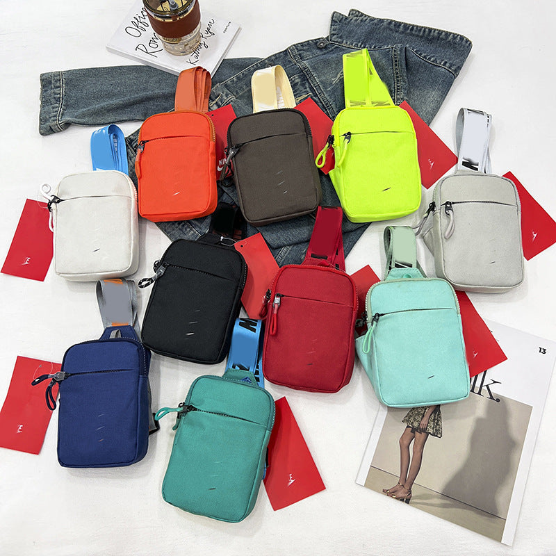 Unisex Mini Nylon Crossbody Sling Bag Chest Pouch Adjustable Wide Strap Lightweight Orange for Travel Sports & Festivals