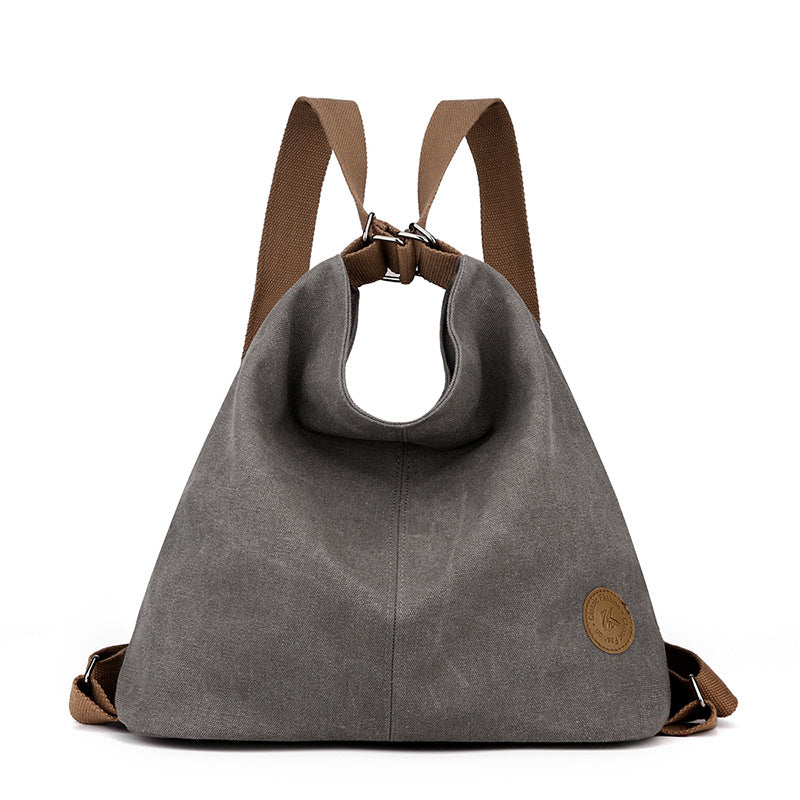 Grey Versatile 3-in-1 Canvas Backpack and Shoulder Bag Large Capacity Handbag for Women Ideal for Travel School and Everyday Use