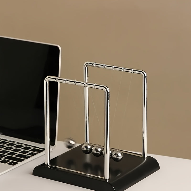 Newton's Cradle, made of durable PP material, is both a desktop physics demonstration pendulum and a stress-relieving decorative piece for offices and homes, ideal as a creative gift.