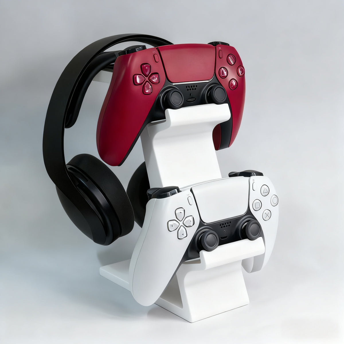 ORANGE 3-in-1 PS5 and Xbox Controller Stand – Compatible with PlayStation 5/Xbox Consoles. A gaming desktop organizer with a headphone hanger, non-charging base that holds 2 controllers and headphones. Space-saving white/black console accessory.