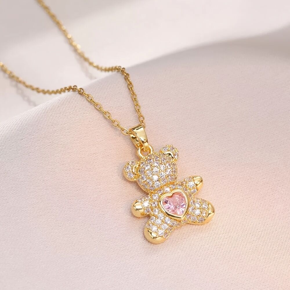A delicate and adorable pink heart-shaped bear pendant copper necklace, adorned with synthetic zirconia, paired with a stainless steel chain, decorated with synthetic zirconia, perfect as a daily jewelry gift or a sweet and cute party accessory.（gold））