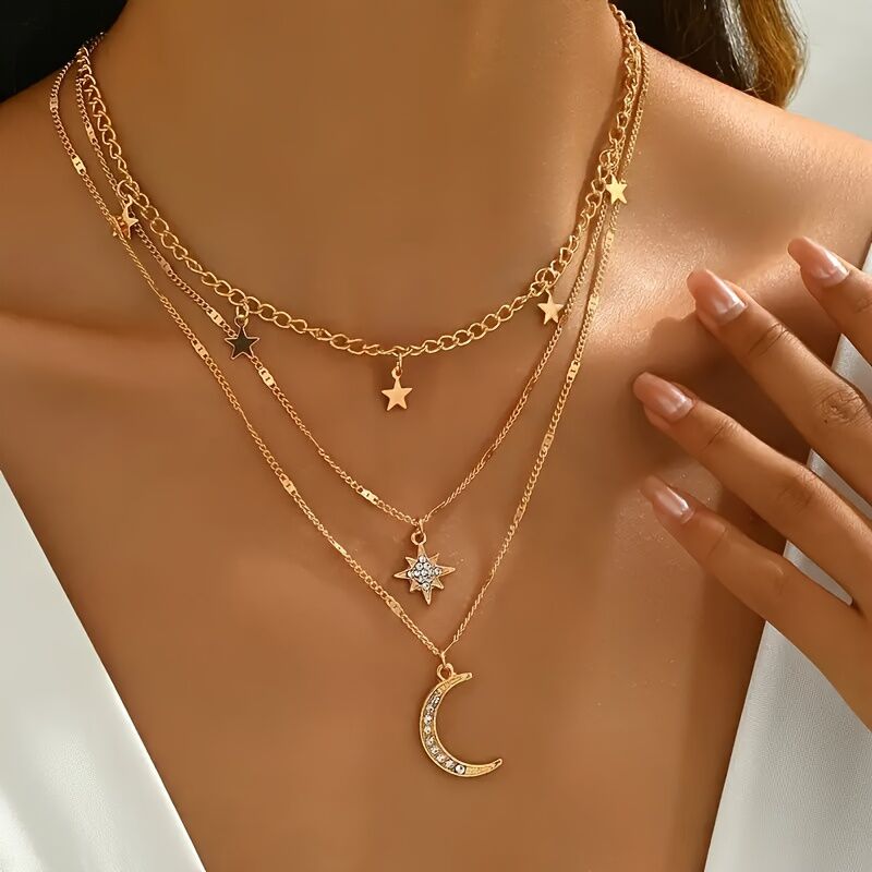 An elegant star, crescent, and sparkle rhinestone-embedded collarbone necklace, a multi-layer pendant necklace for women, perfect for daily wear and a versatile gift.