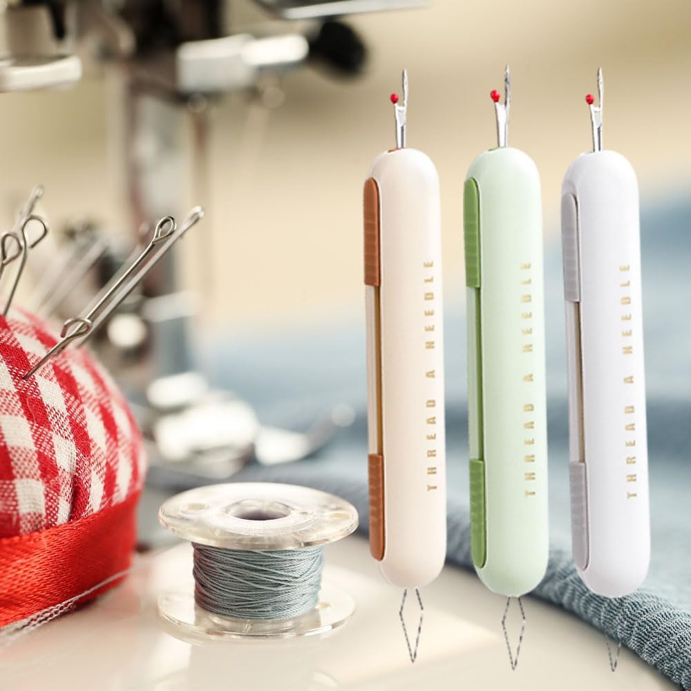 Seam ripper - Needle threader - Sewing supplies - Seam opener - Needle threader - Sewing supplies - Seam ripper - Needle threader - Clothing repair - Sewing tools - Sewing accessories - Embroidery - Sewing box filling - Needle and thread - Multicolor - 3