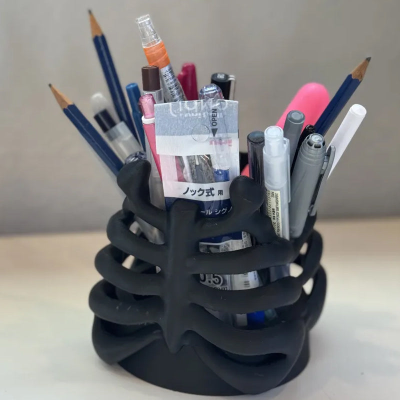 3D Printed Rib Pen Holder - Skeleton Desktop Organizer is both a practical pen holder and a sculpture.