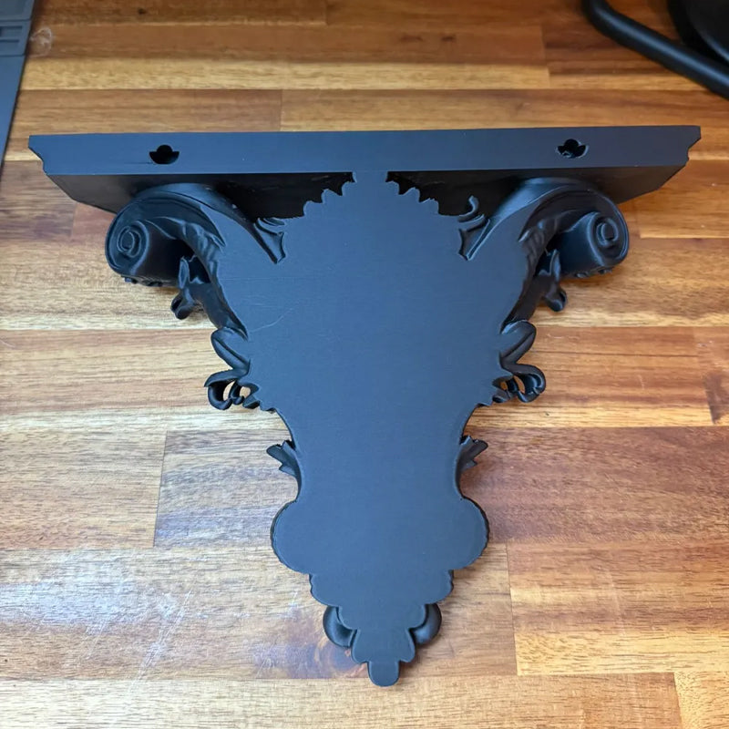 3D-printed Gothic wall shelf brackets add a touch of classic Gothic elegance to your interior. Black