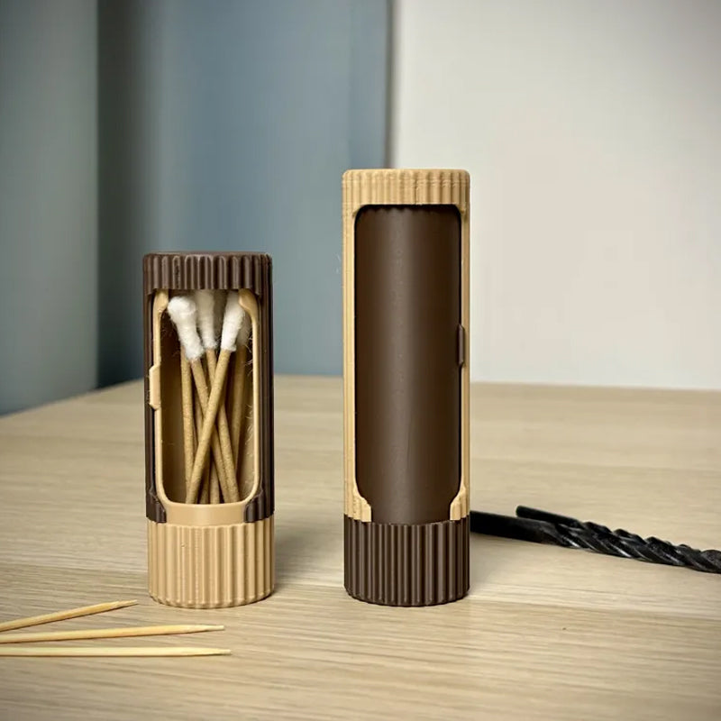 3D-printed compact rotating organizer capsule, 1.5 inches long x 4.9 inches high.