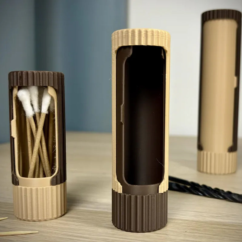 3D-printed compact rotating organizer capsule, 1.5 inches long x 4.9 inches high.