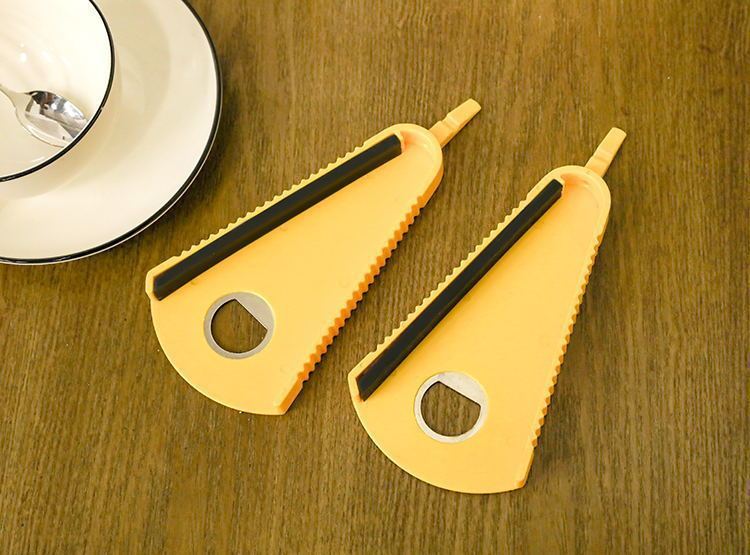 Multi-functional bottle cap opener