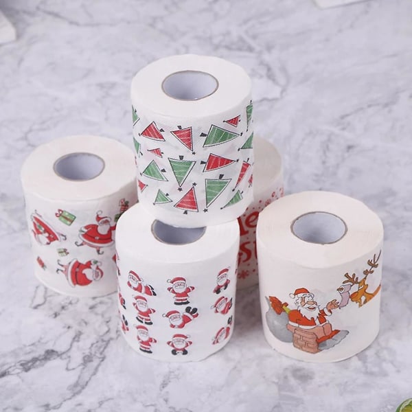 rolls of Christmas themed toilet paper for home, office or restroom