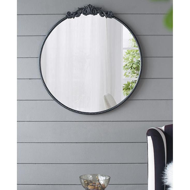 ROUND ORNATE METALLIC WALL MIRROR