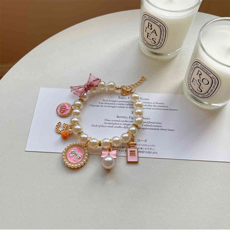 Pink 4-PCS Pearl Charm Pet Necklace - Adjustable Bowknot Collar for Small Dogs & Cats (S: 20+5CM)