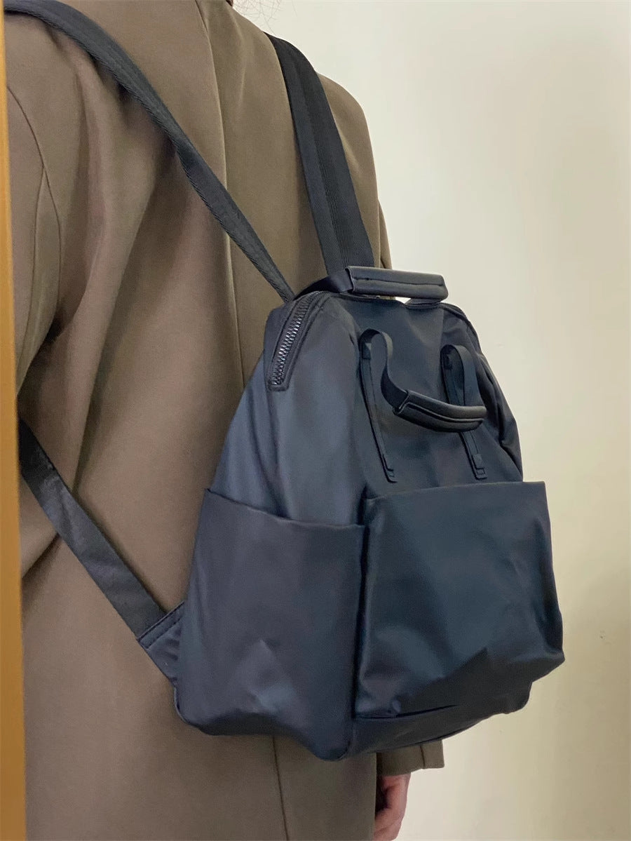 Size S Black Stylish Waterproof Nylon Backpack - Lightweight, Multi-Pocket for Travel, Commute & Daily Use