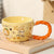 Whimsical Cat & Friends Ceramic Mug - 320ml with Unique Twisted Handle (Yellow)