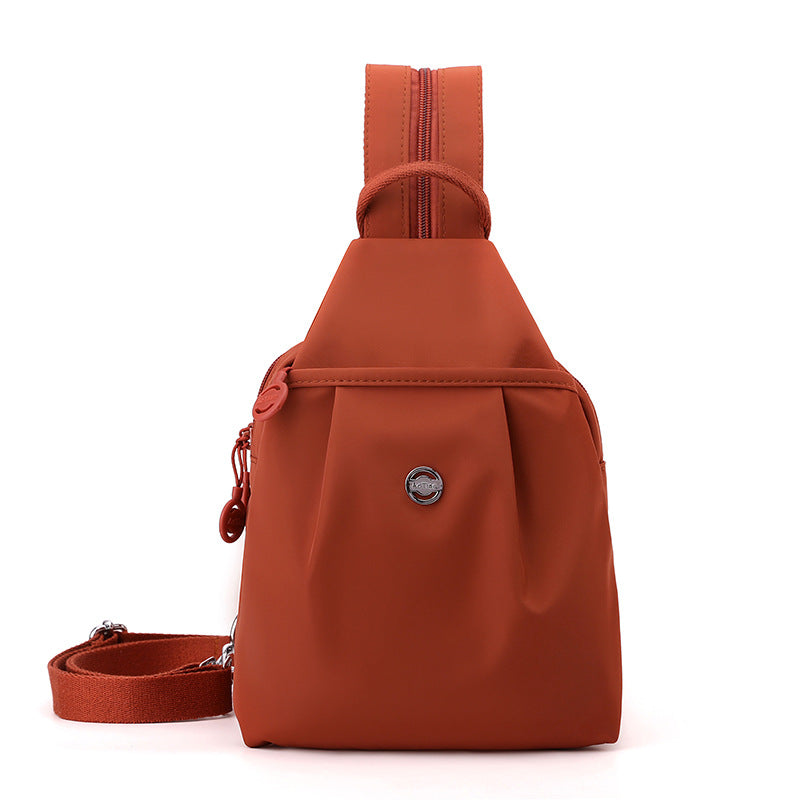 Orange Versatile Women&#39;s Convertible Mini Backpack &amp; Sling Bag - Stylish Anti-Theft Oxford Cloth Daypack, Fits 9.7in iPad