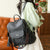 Black Chic Women's PU Leather Convertible Backpack - Anti-Theft Design, Multi-Pocket Shoulder Bag with Tassel