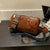 Black Vintage Embossed Crossbody Barrel Bag with Wide Adjustable Guitar Strap