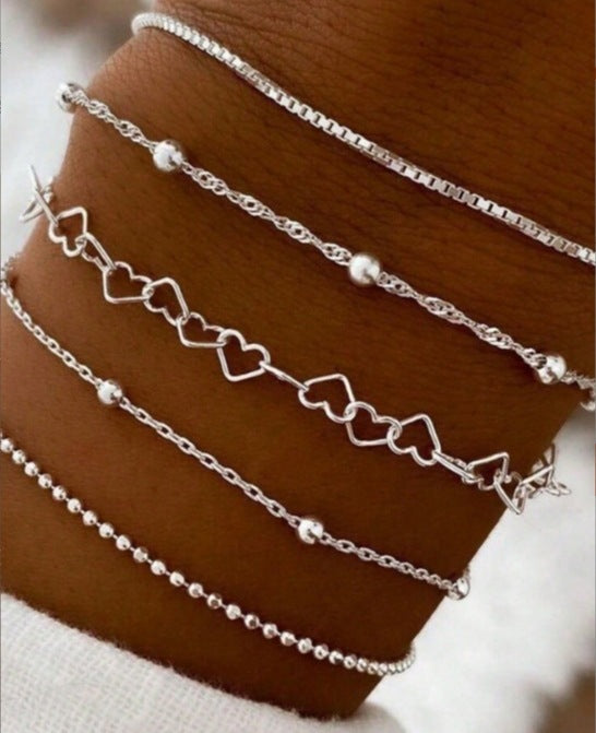 A Silver six-piece set Chic Multi-Layered Alloy Bracelet Set - Fashionable Stackable Jewelry