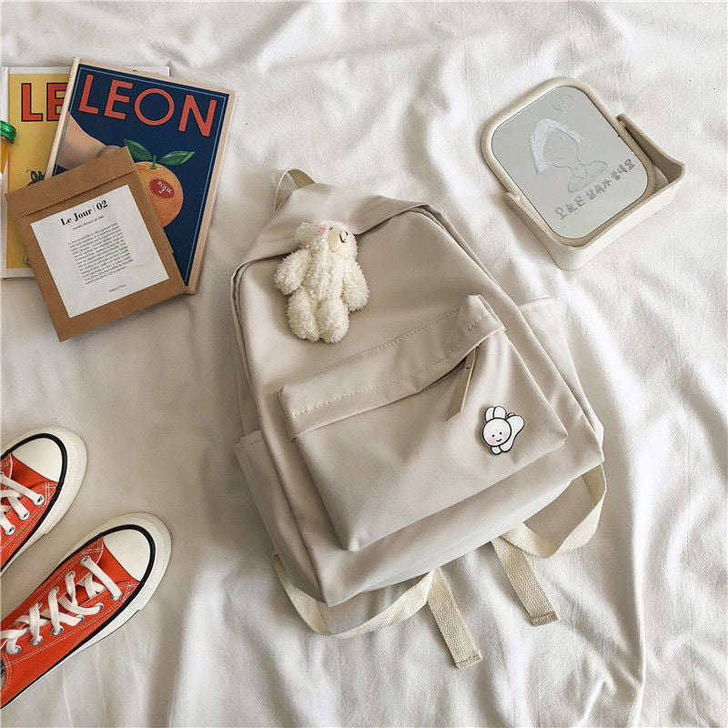 Aesthetic Off-white School Backpack with Cute Bear Plushie and Pin Large Capacity Nylon Laptop Daypack for High School and Uni Students