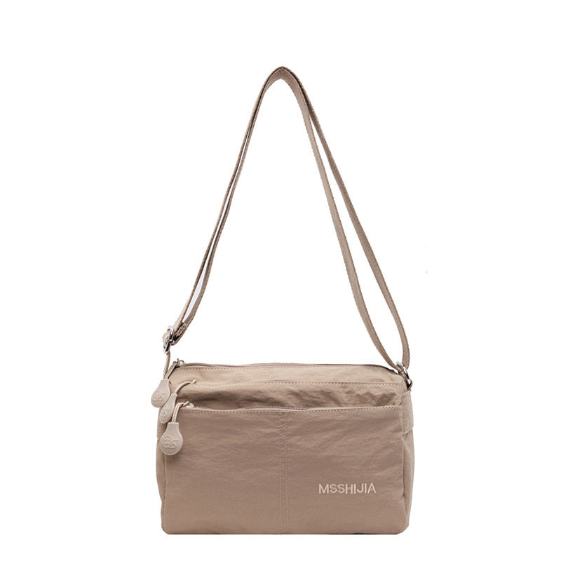 Women's Nylon Crossbody Bag Multi-Pocket Water Resistant Shoulder Messenger Handbag Lightweight Casual Satchel with Adjustable Wide Strap for Travel and Daily Use Khaki