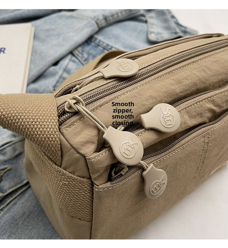 Women's Nylon Crossbody Bag Multi-Pocket Water Resistant Shoulder Messenger Handbag Lightweight Casual Satchel with Adjustable Wide Strap for Travel and Daily Use Khaki