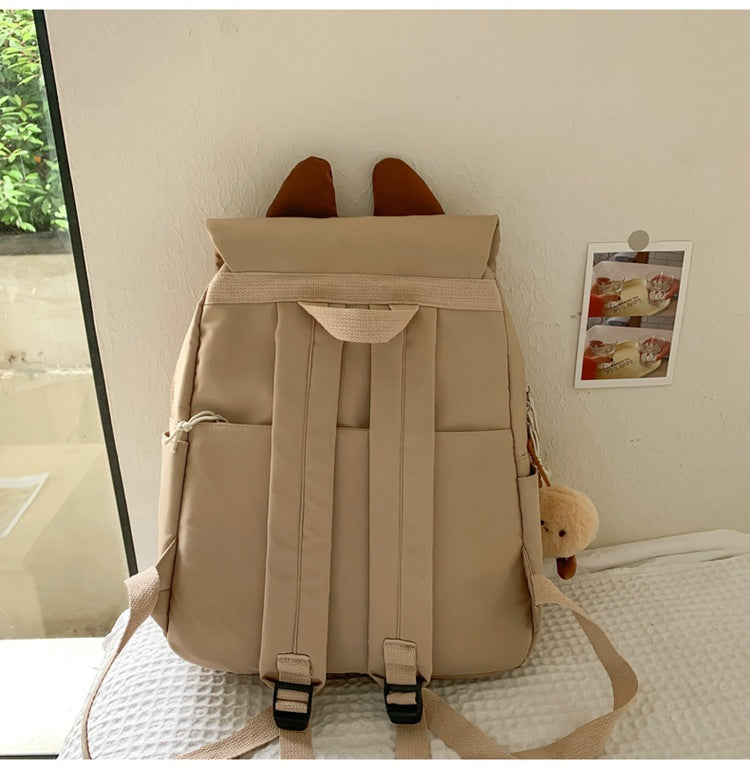 White Lightweight Nylon Waterproof Schoolbag for Children - Large Capacity Daypack with Ugly-Cute Cat Design