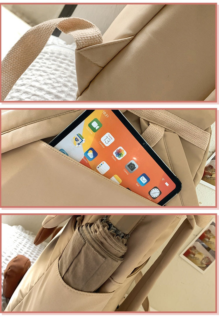 White Lightweight Nylon Waterproof Schoolbag for Children - Large Capacity Daypack with Ugly-Cute Cat Design