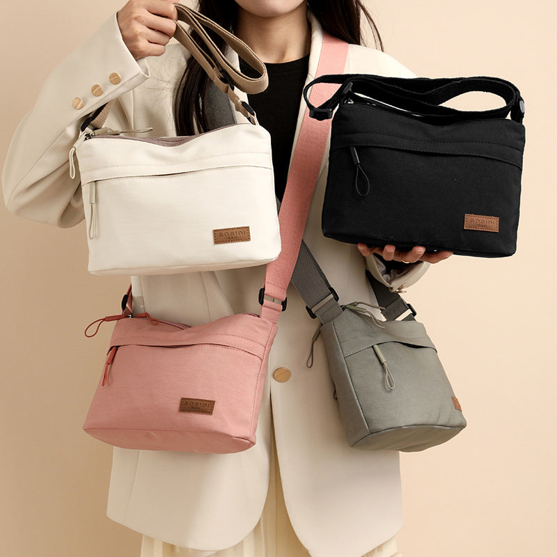 White Women Lightweight Nylon Crossbody Bag with Multiple Pockets Compact Shoulder Bag for Travel and Daily Essentials in Australia
