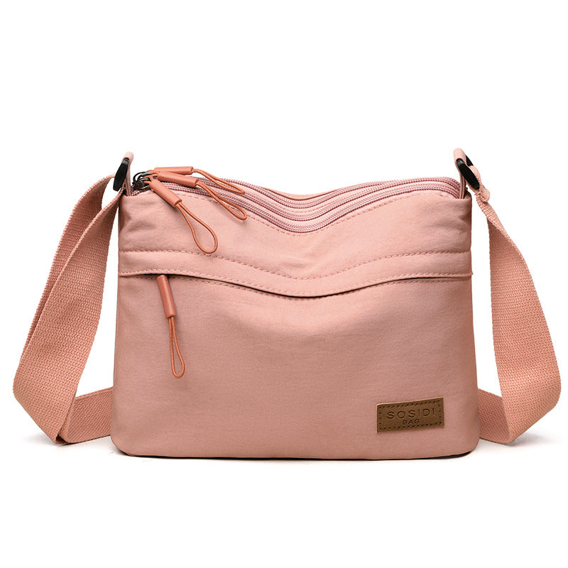 Pink Women Lightweight Nylon Crossbody Bag with Multiple Pockets Compact Shoulder Bag for Travel and Daily Essentials in Australia