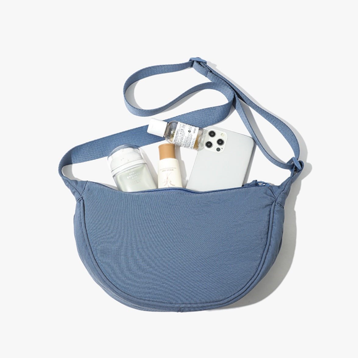 Sea blue Lightweight Nylon Crossbody Bag – Compact Saddle Style with Adjustable Strap for Everyday Use