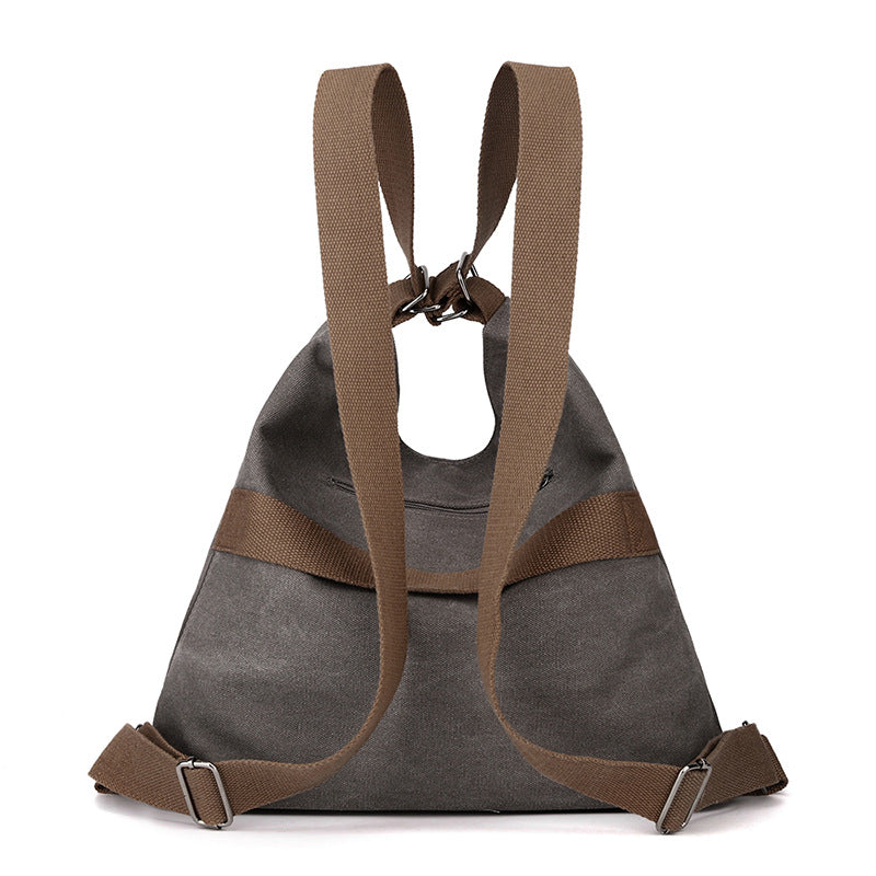 Purple Versatile 3-in-1 Canvas Backpack and Shoulder Bag Large Capacity Handbag for Women Ideal for Travel School and Everyday Use