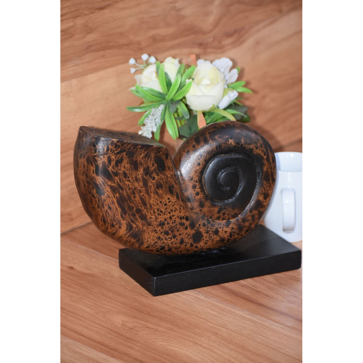 Decorative hand carved wooden shell on stand